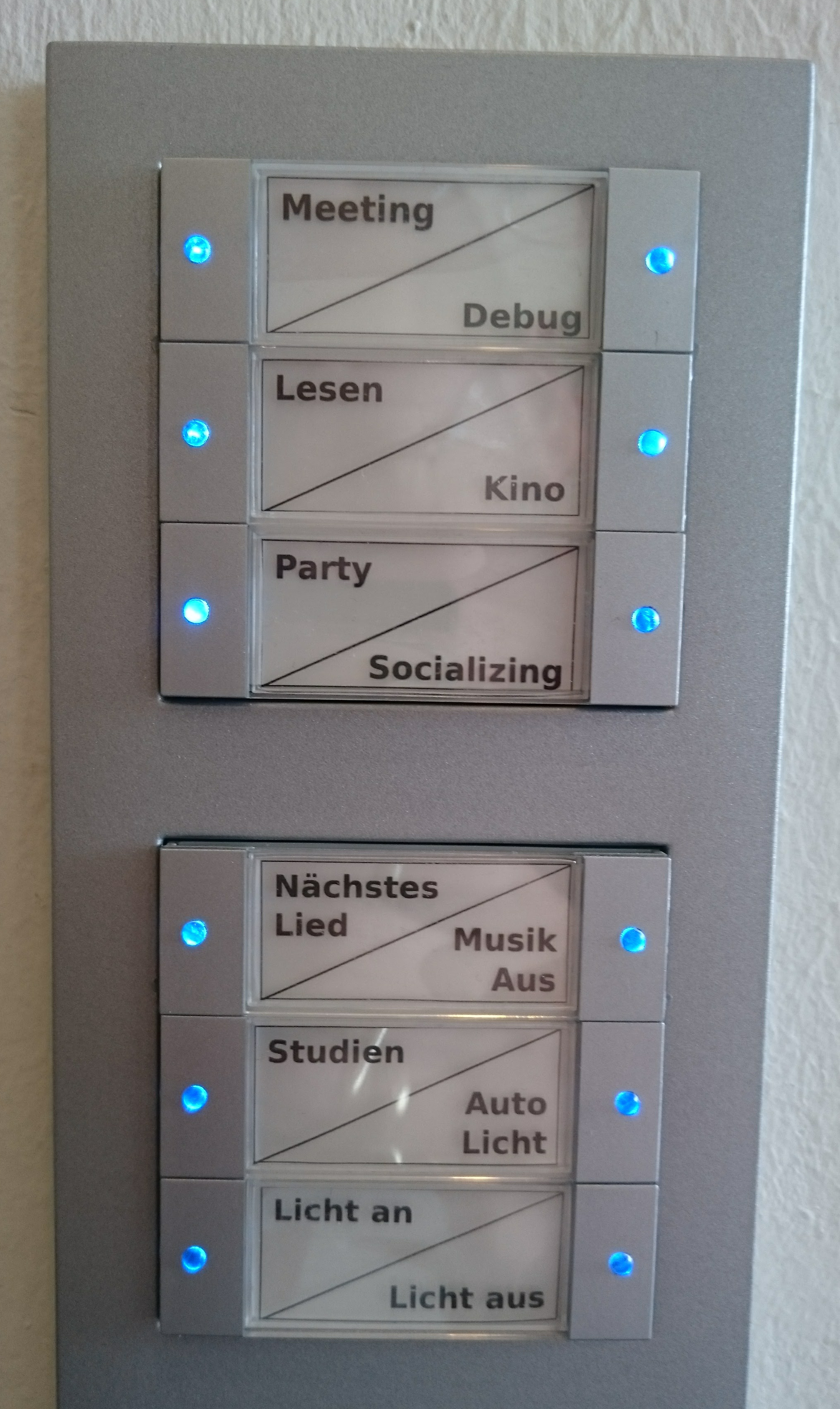 Buttons mounted at the end of the hallway